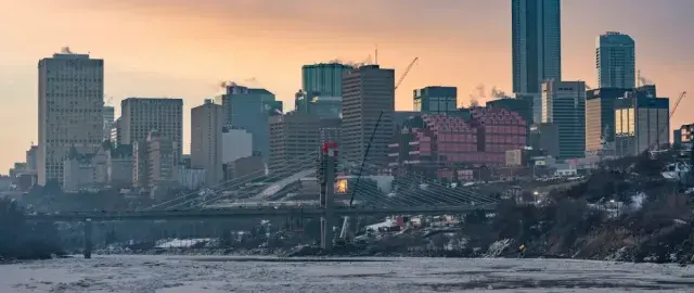 Skyline of Edmonton, with a bridge in the foreground and buildings in the background