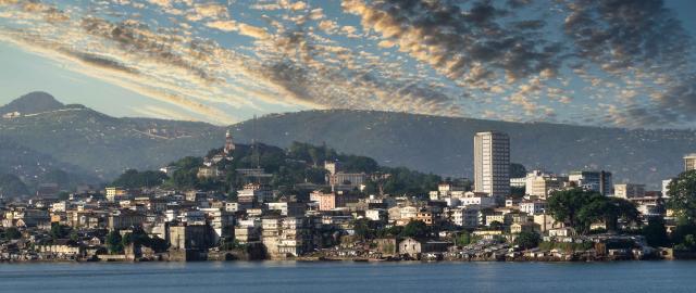 skyline of Freetown, Sierra Leone with harbor in foreground and cityscape in background