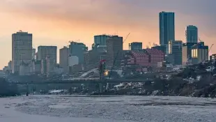 Skyline of Edmonton, with a bridge in the foreground and buildings in the background