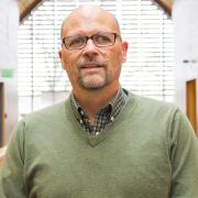 Headshot of Oswald Schmitz in Kroon Hall